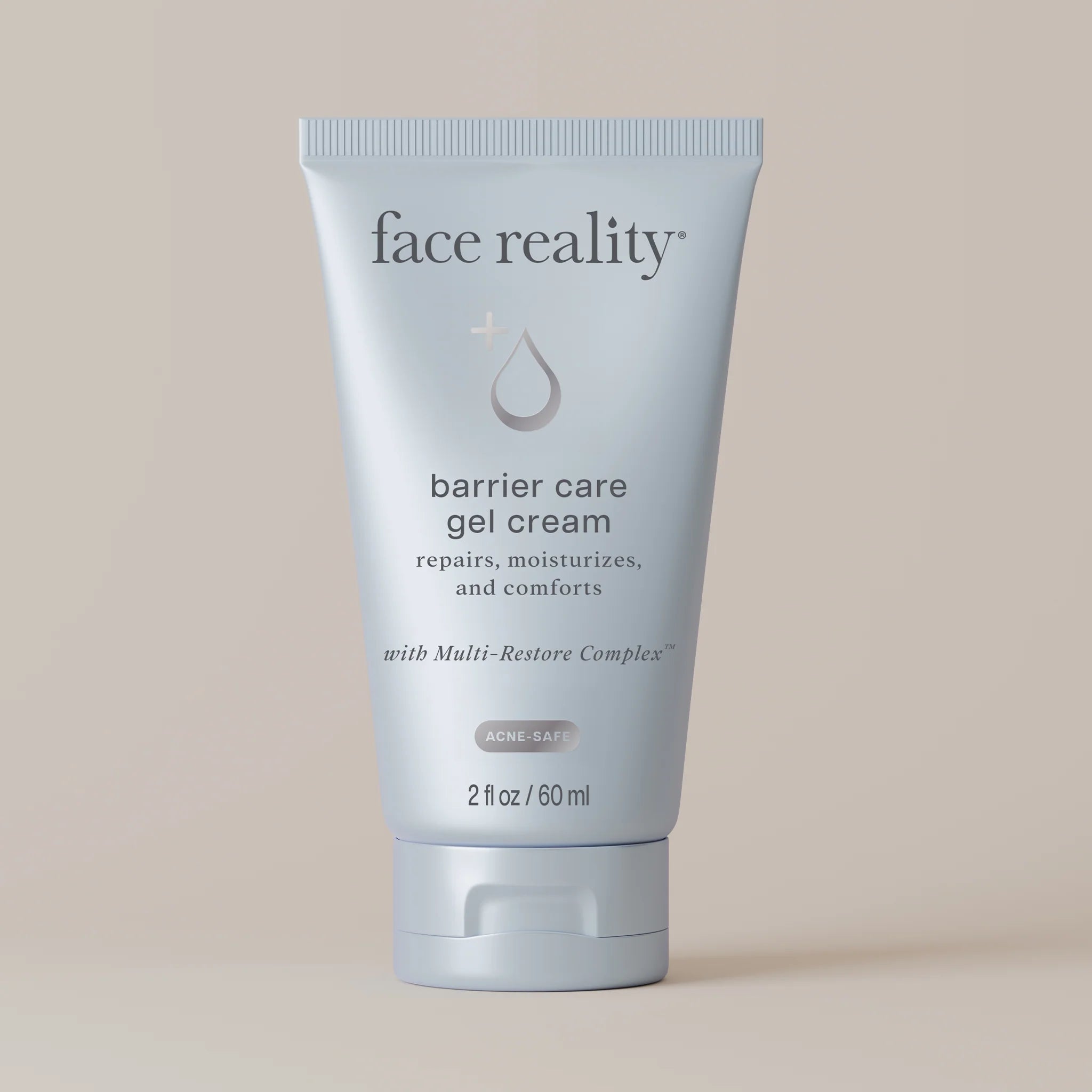 Tube of face reality barrier care gel cream on a beige background