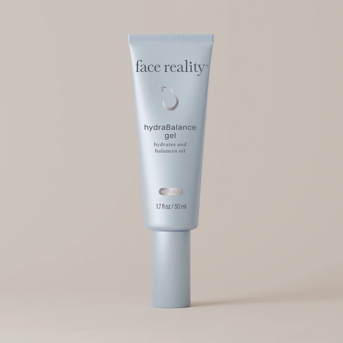 Face Reality's hydraBalance gel light blue product tube against beige background