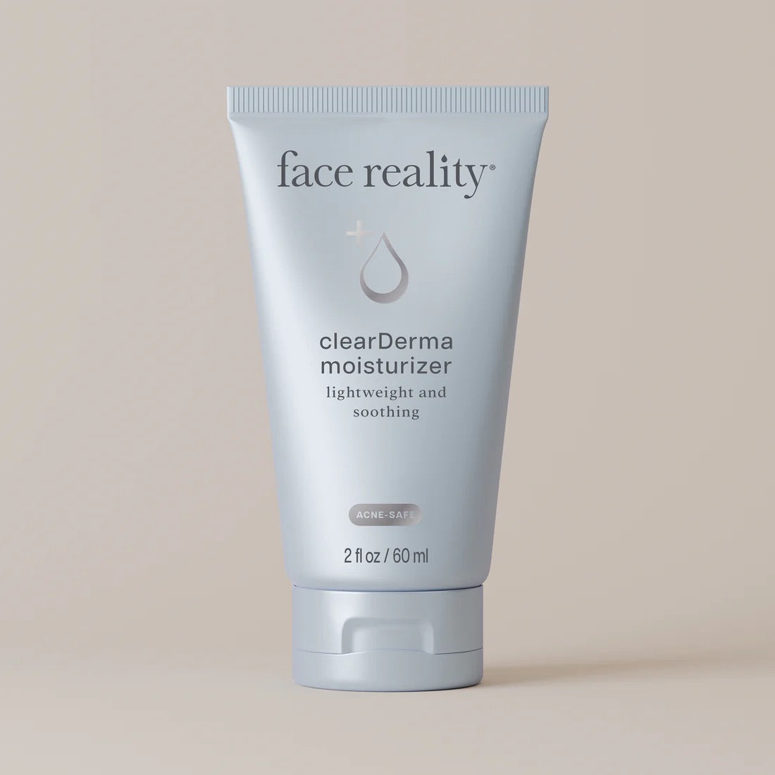 Face Reality's clearDerma moisturizer light blue product tube against beige backdrop