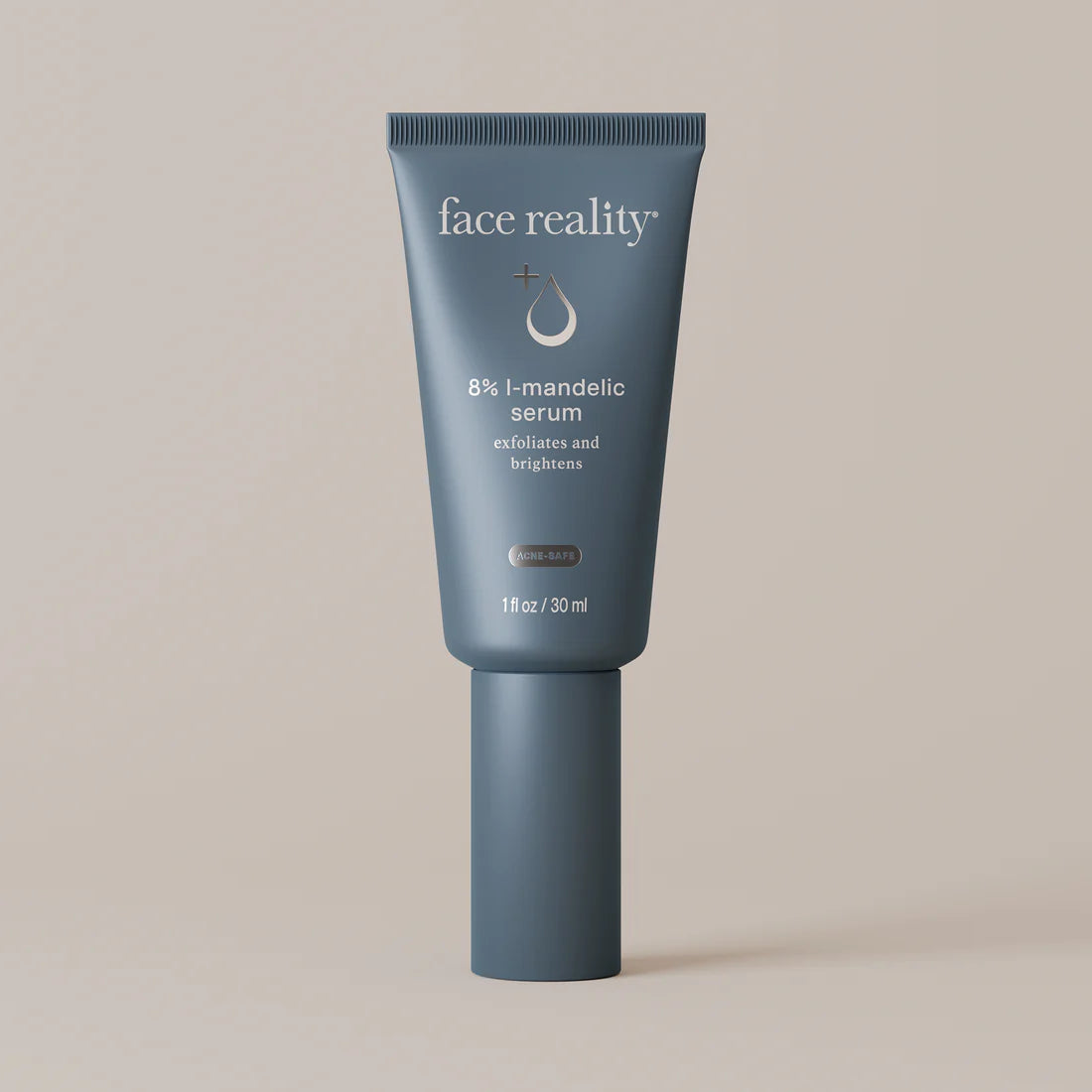 Face Reality's 8% L-mandelic serum blue tube packaging against beige background