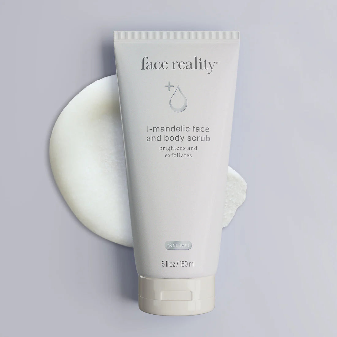 Tube of 'face reality' I-mandelic face and body scrub on a gray background