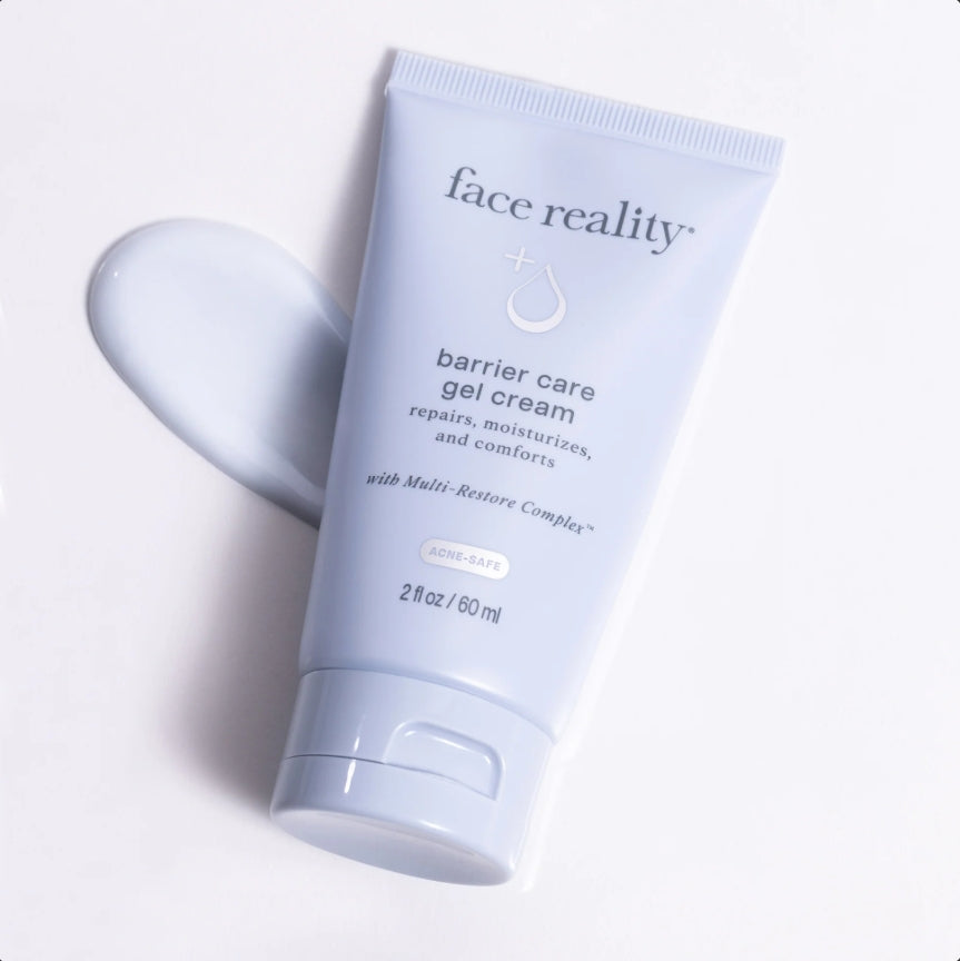 Face Reality's barrier care gel cream light blue product tube with white product swatch laying on white background