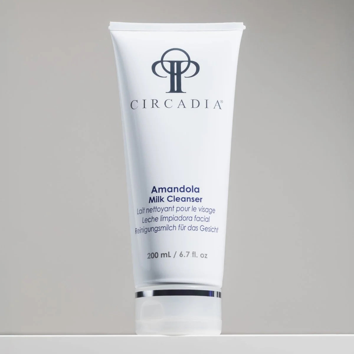 Circadia Amandola Milk Cleanser tube on a gray background