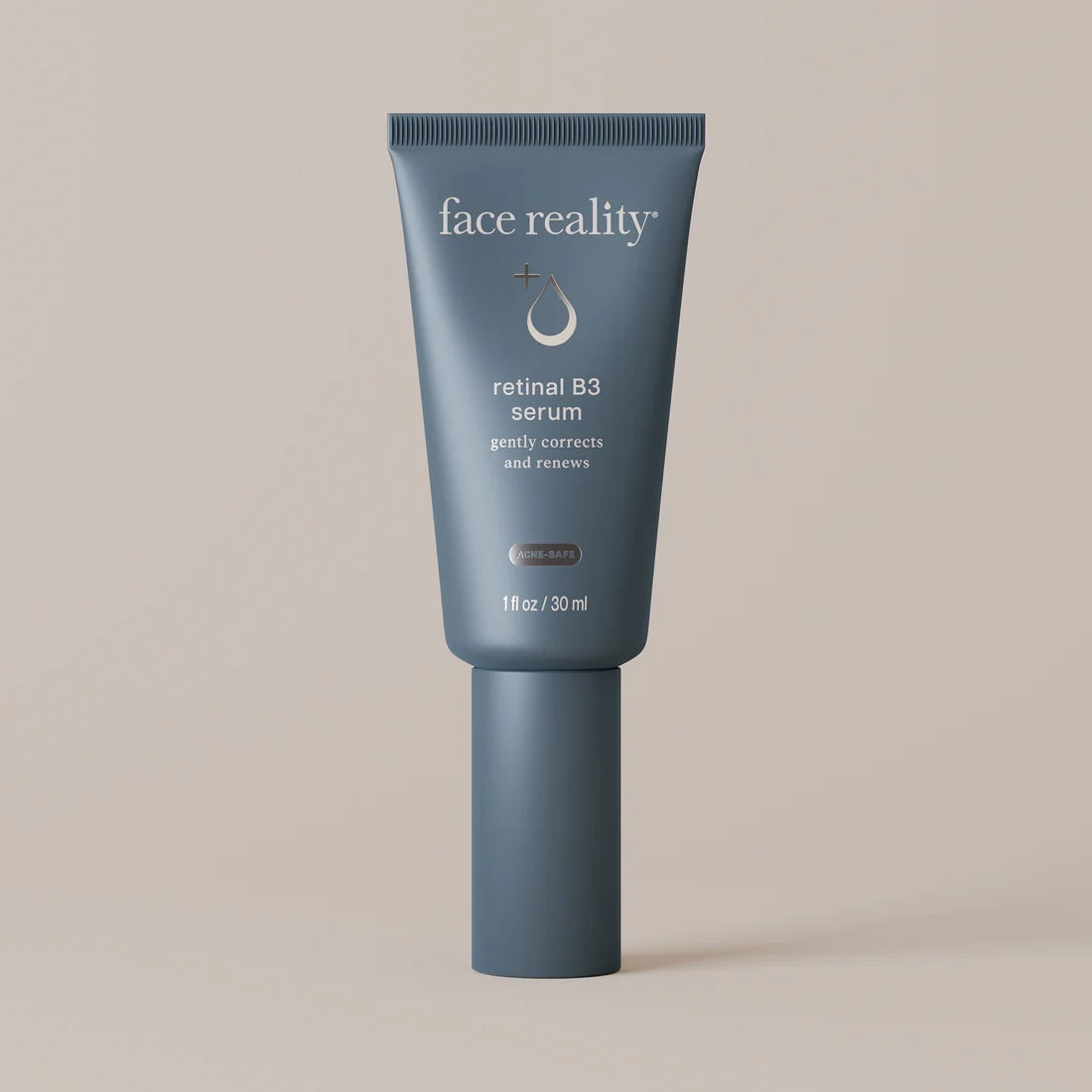 Face Reality's retinal B3 serum in blue product tube against beige background